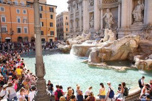 Tourist surrounding Trevi Fountain, Rome, Italy